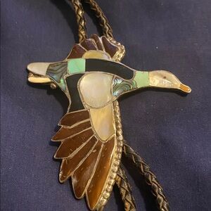 Inlay bolo tie by Ray & Bernice Wyaco Zuni
